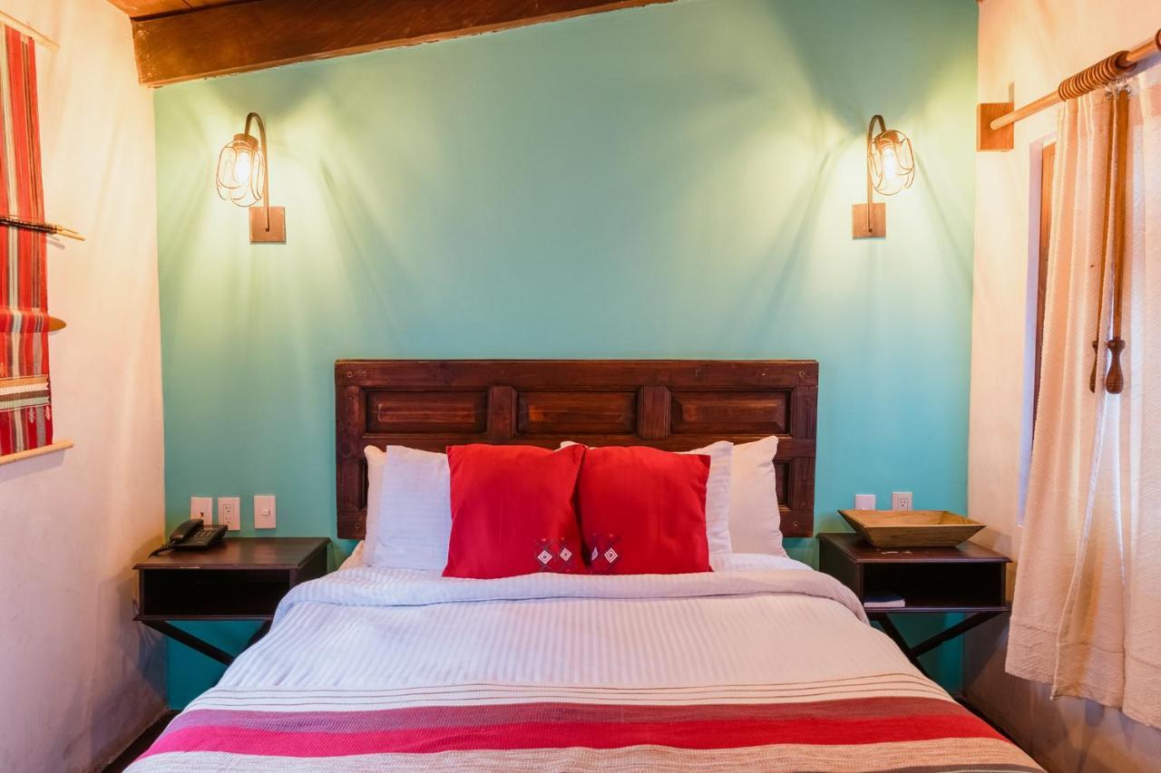 Yox Hotel Boutique Сан-Кристобаль-де-Ла-Касас Экстерьер фото A bedroom at the hotel
